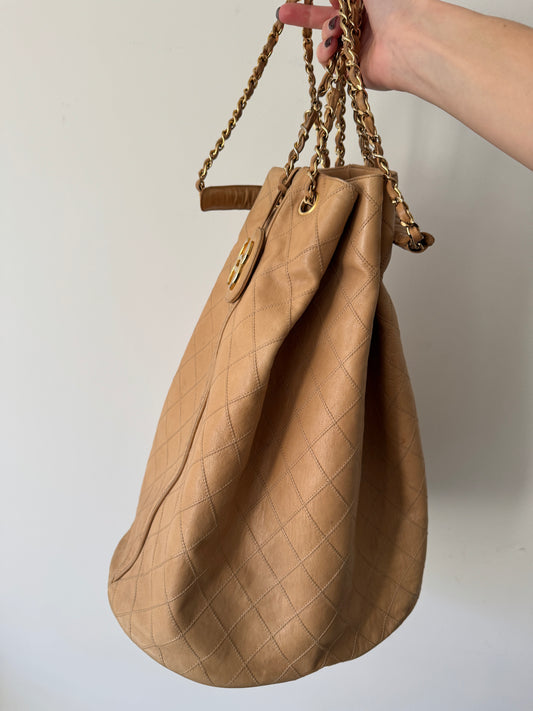 Chanel Quilted Coco Mark Chain Bucket Bag — Late 1980s